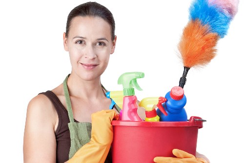 Cleaner preparing equipment for a booked service